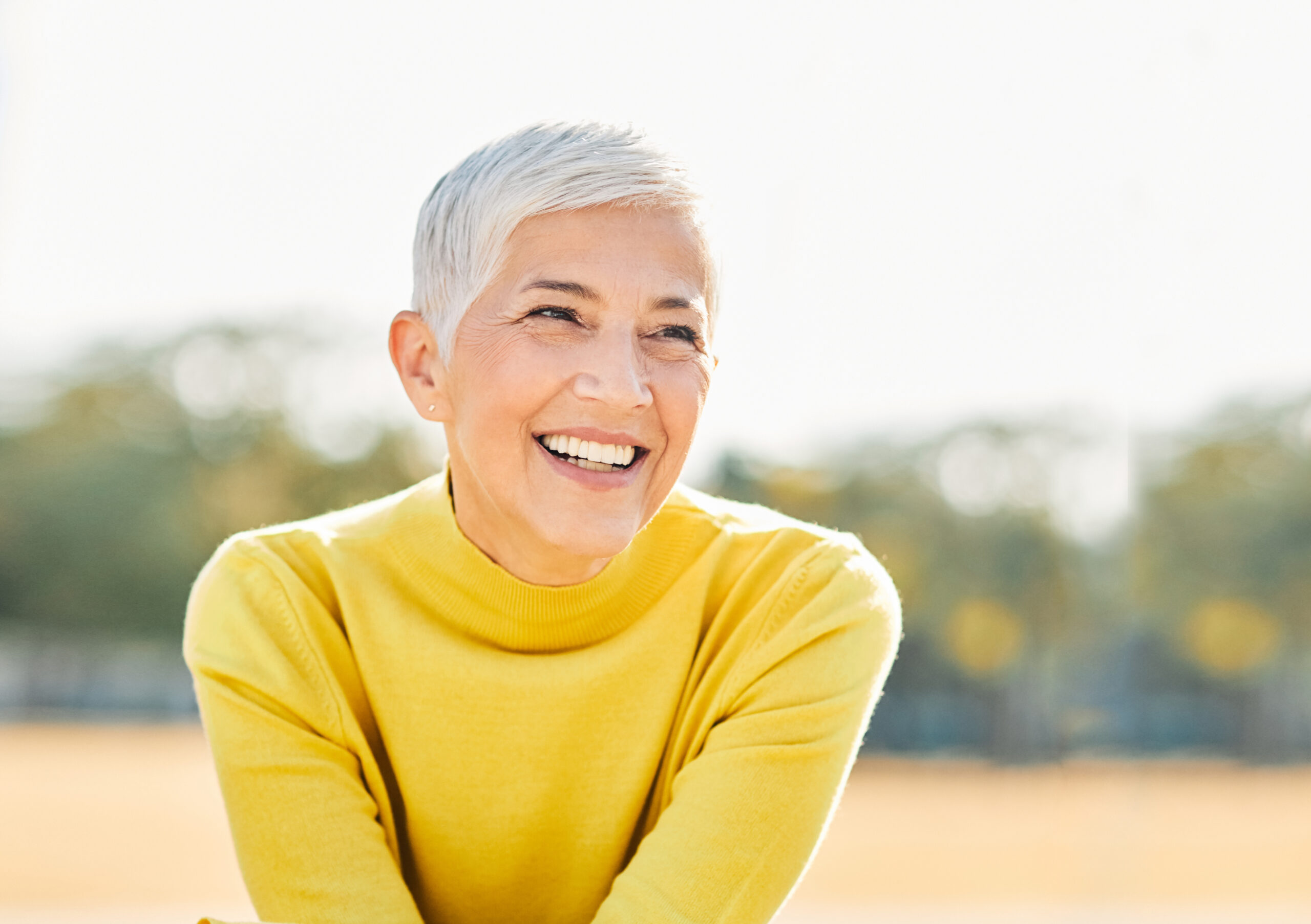 woman smiling outdoors