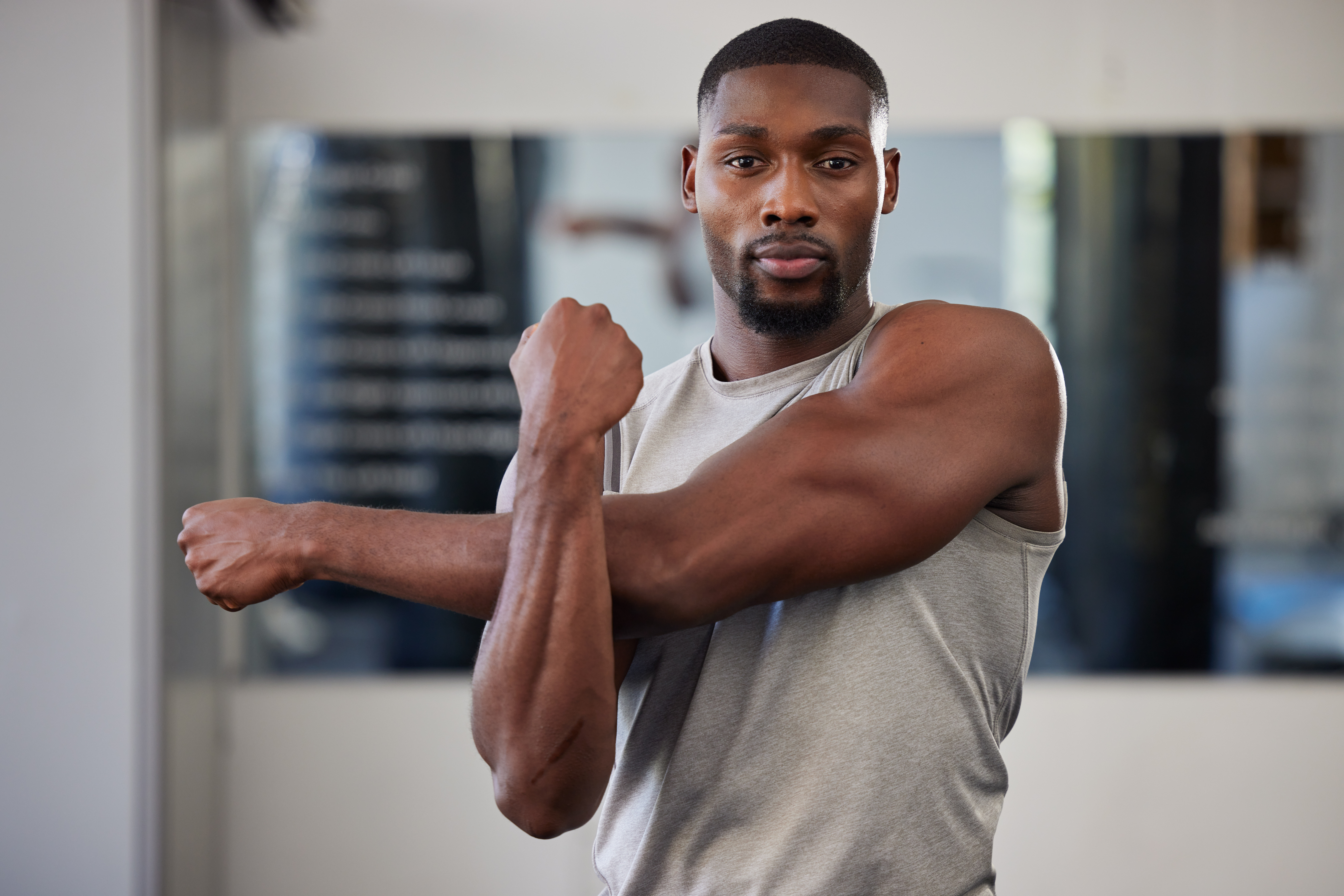 Fit man stretching