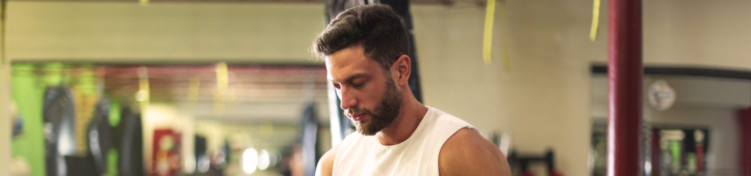 Fit man using a laptop